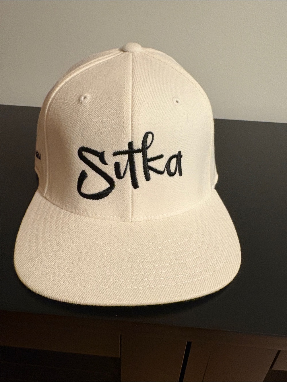 Sitka Cream Snapback Hat with Black Script Logo